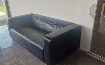 For sale: Black faux leather sofa's